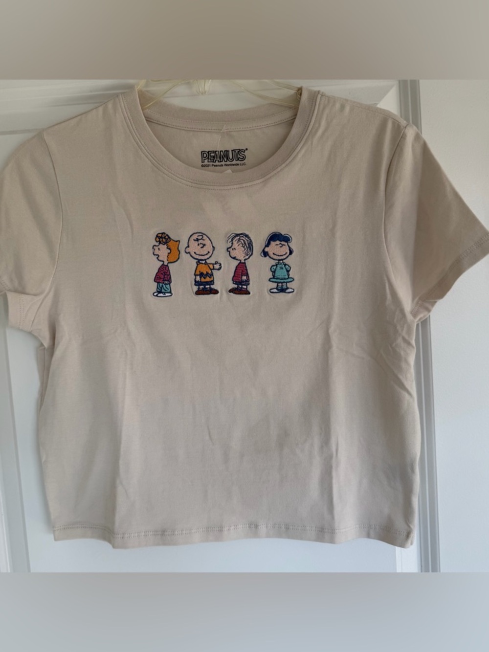 Peanuts Cream Cropped Short Sleeve Tee with Colorful Embroidered Characters